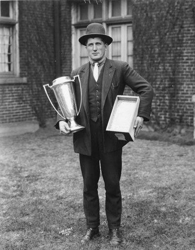 L.E. Peterson, Trophy Winner for wheat production.