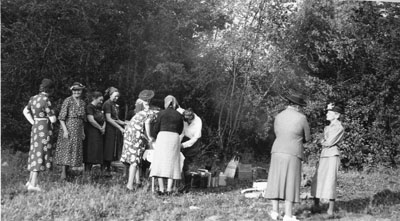 Group of women setting up a picnic