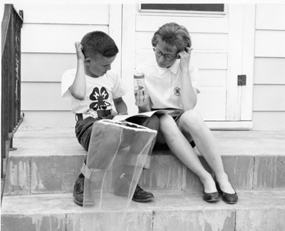 Ronald Haae and Diana Malkuch from Glendive, MT classify insects that they caught in a jar.