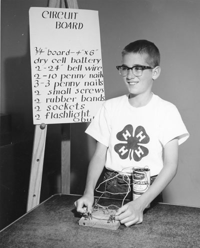 Douglas Kosty from Miles City, MT gives a demonstration on the cirucuit board he built for a 4-H demonstration.