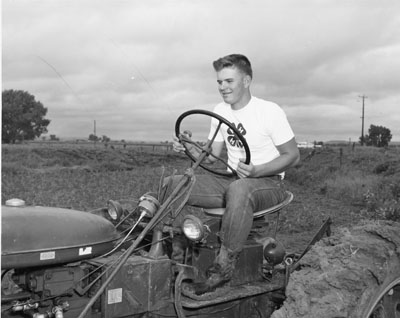Charles Heyn from Billings, MT rides a tractor used in his family