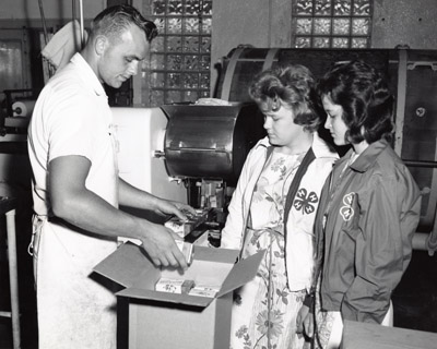 Brenda Hansen and Ann Maier of Glendive Tour a Dairy Plant.