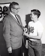 Max Mathews presents a Medal of Honor to John Nelson, Huntley, Montana