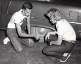 Ken Kindsfather and Gayle Rintala from Silesia, Montana, Set the Air pressure of a Tire