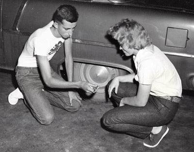Ken Kindsfather and Gayle Rintala from Silesia, Montana, Set the Air pressure of a Tire