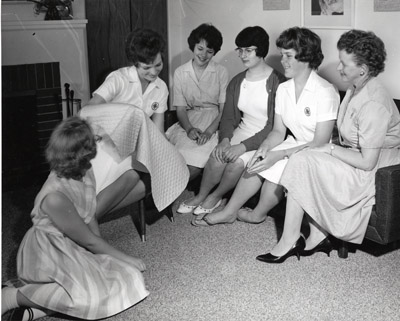 Ande Mae Barney Shows Other Members of her 4-H Club Material She Plans to use to Make a Skirt