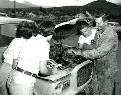 Ron Klessens, from Red Lodge, Montana, shows a Group of 4-H Automotive Club Members the Cartridge Inside an Air Cleaner