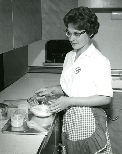 Sandra Henderson, from Billings, Montana, Mixes Ingredients to Bake Biscuits.