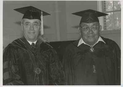 President Mike Malone and William Tall Bull