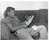 Man reading a letter, 1959