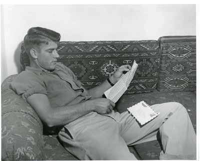 Man reading a letter, 1959