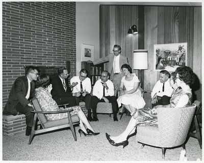 Ph.D graduates and wives at the home of Dr. Leon Johnson, 1962