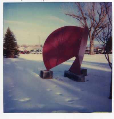 Snow plow sculpture in front of Creative Arts Complex, 1985