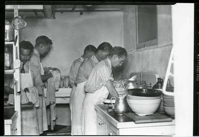 Students washing dishes, 1956-1957