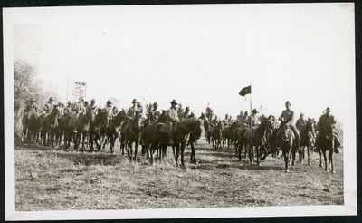 SATC members of the ROTC on horseback