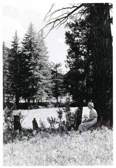 Mrs. Mary Sales Mills sitting next to a tree, June 16, 1940