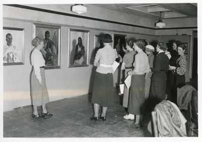 Group of students looking at artwork