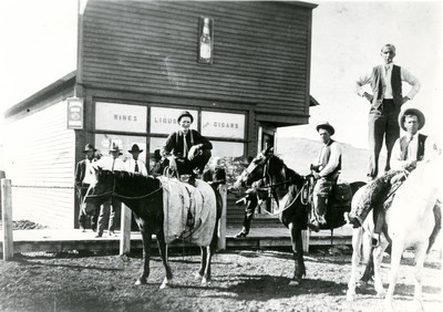 Cowboys in front of saloon