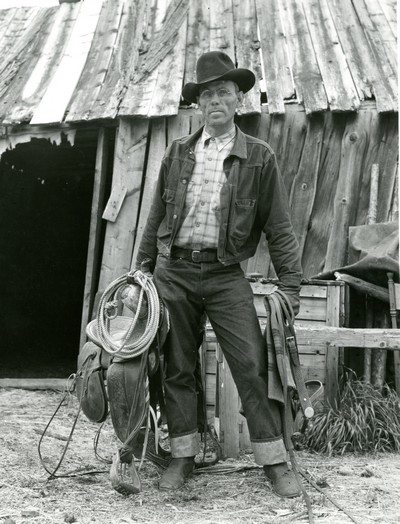 Walter Latta with saddle and bridle