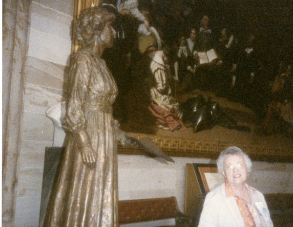 Norma Smith in front of Jeannette Rankin Statue