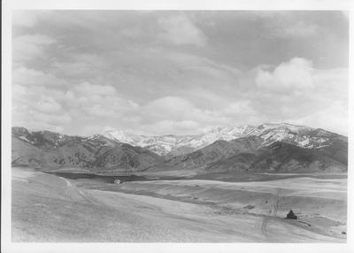 Bridger Mountains background to farmhouses