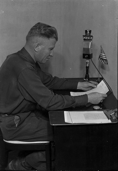 Woolley broadcasting at KRBM radio station