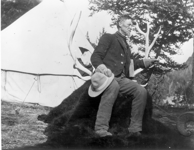John Yancey with elk horns he brought President Roosevelt