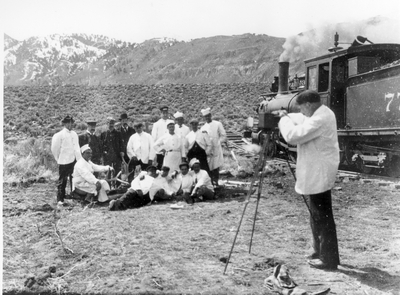 Roosevelt's train at the Y in Cinnabar; photographer recording the crew