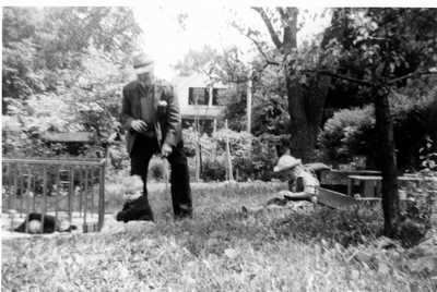 J W. (Jack) Hart & young children playing