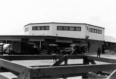 A livestock auction company building & parking lot