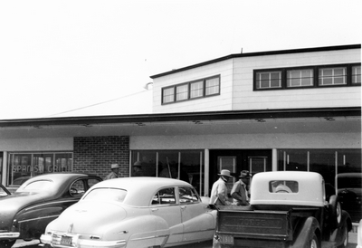 A livestock auction company building & parking lot