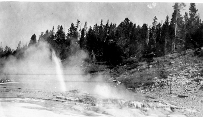 Steam rising from a geyser basin - Yellowstone National Park