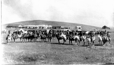 Mounted cowboys near Utica, Montana