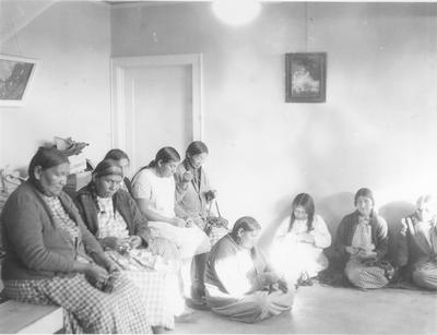 Arapaho Women Working at Crafts Beading