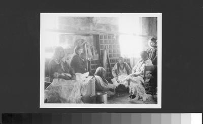 Arapaho Women Working at the Craft of Tanning Animal Hides
