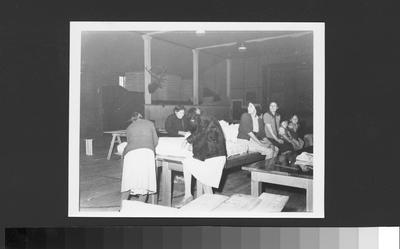 Three 20th Century Arapaho Women Sewing Mattresses