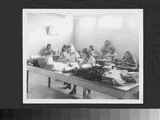 Photo of Arapaho Women Working in the Sewing Industry