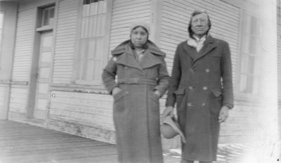 Eddie and Cecile Big Beaver waiting for a train, Browning, Montana, 1932