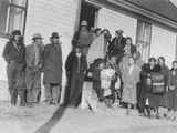 Photo of a large group of people dressed in winter clothes, Browning, Montana