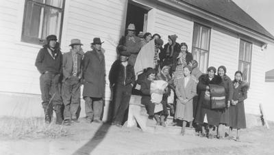 Photo of a large group of people dressed in winter clothes, Browning, Montana