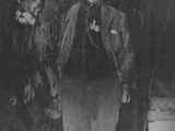 Black and white photo of Kootney Brown and his dog, Waterton Lakes National Park, Canada