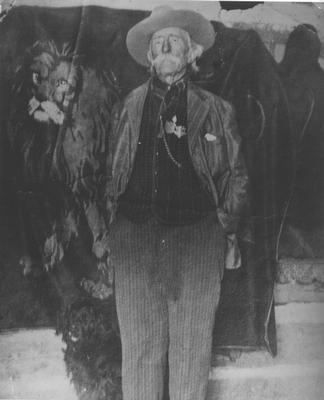 Black and white photo of Kootney Brown and his dog, Waterton Lakes National Park, Canada