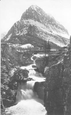 Black and white photo of Mt. Rising Wolf and waterfall, Glacier National Park, Montana