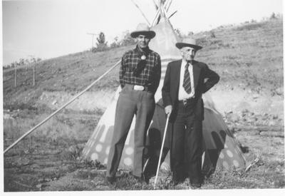 Lone Wolf and James Willard Schultz In Front of Tipi