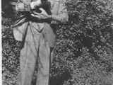 James Willard Schultz Holding a Cat