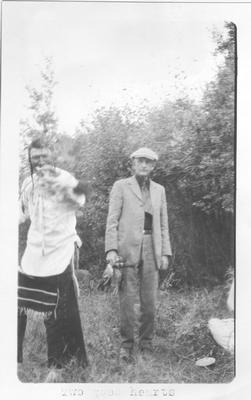 Two Men in an Early 20th Century Camp