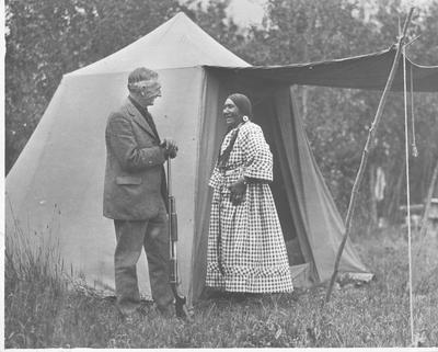 James Willard Schultz with Bear Head and Mrs. Bear Head: Mrs. Bear Head