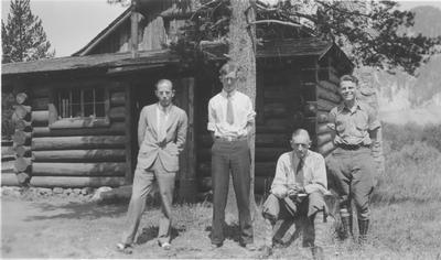 Photo of four men, part of Schultz