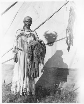 Mrs. James Willard Schultz (Apaki) Participating in a Blood Indian Ceremony With Her Face Painted